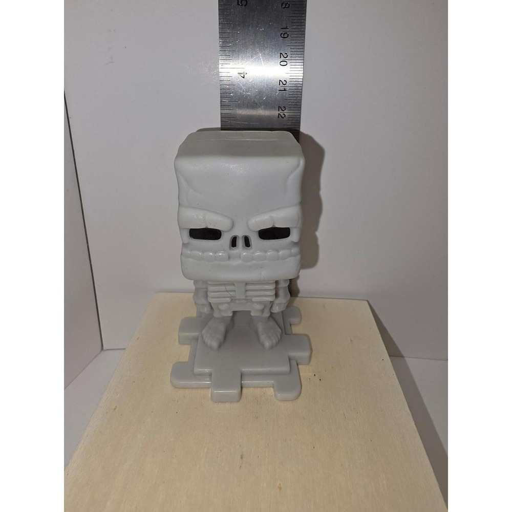 McDonald's Happy Meal toy featuring a skeleton character from the 2025 Minecraft